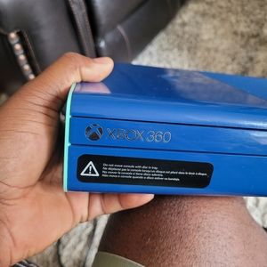 Used Xbox 360 E Console. Mfr date 2014-08-20. Console and charger only.